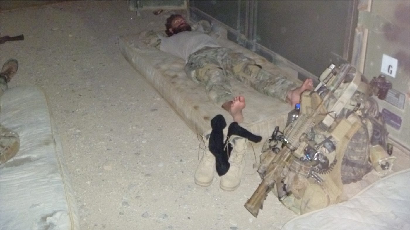 Sleep optimisation — soldier sleeping in field, Afghanistan